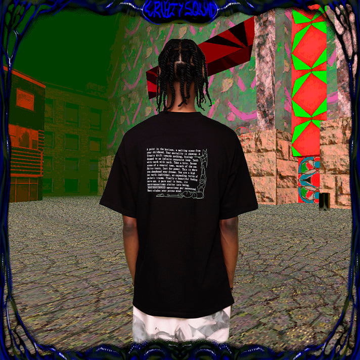 Model wearing black oversize t-shirt with ending text print on the back from Cruelty Squad