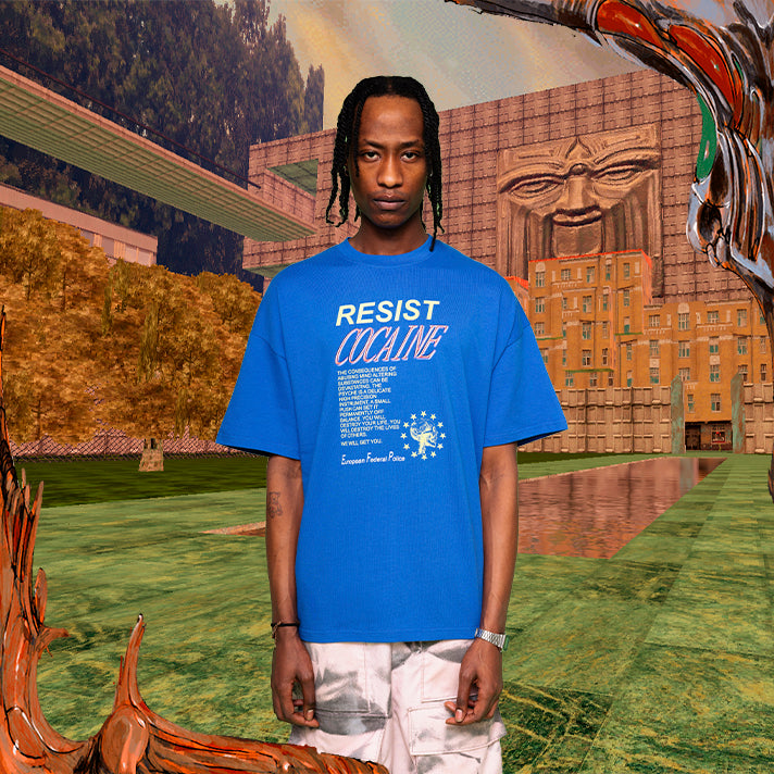 Model wearing blue oversize t-shirt with print from Psycho Patrol R